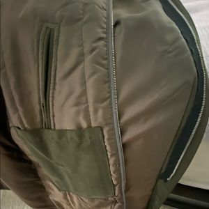 All weather Coat. Removable zip liner. Inside and outside pockets. Gorgeous!